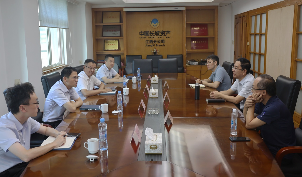 雷軍榮一行前往同業機構拜訪交流